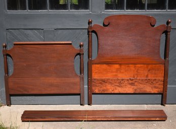 A vintage full size mahogany bed frame