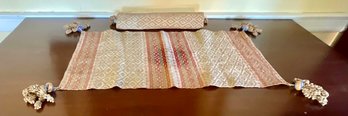 Two antique needlework cloths with porcelain