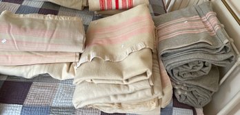 Eleven antique wool blend blankets,