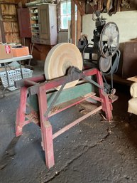 An antique electric powered grinding