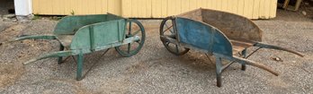 Two antique wheelbarrows in original