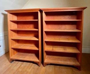A pair of modern pine bookshelves,