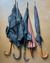 Five vintage umbrellas with four 306a8e