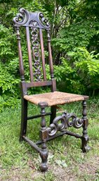 A vintage carved side chair in