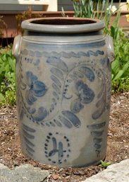 An antique 4 gallon stoneware crock