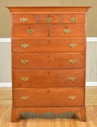 A good early 19th C. cherry nine drawer
