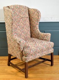 An antique Chippendale wing chair 306af4
