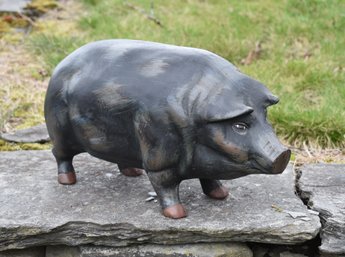 A vintage painted cast iron pig 306b12
