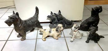 Six antique Scotty dog doorstops,