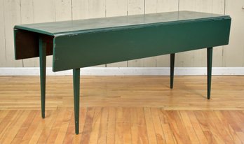 A vintage green painted drop leaf