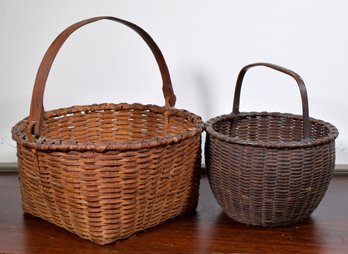 Two antique woven splint baskets,