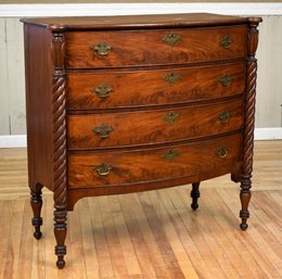 An antique American carved mahogany
