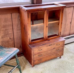 An antique childs size set back cupboard,