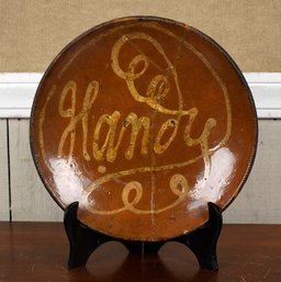 An antique American redware charger/dish