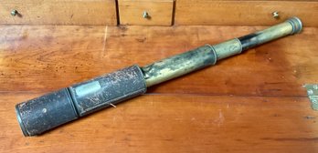 An antique leather wrapped brass 306c47