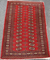 A vintage Bokara scatter rug with 306c65