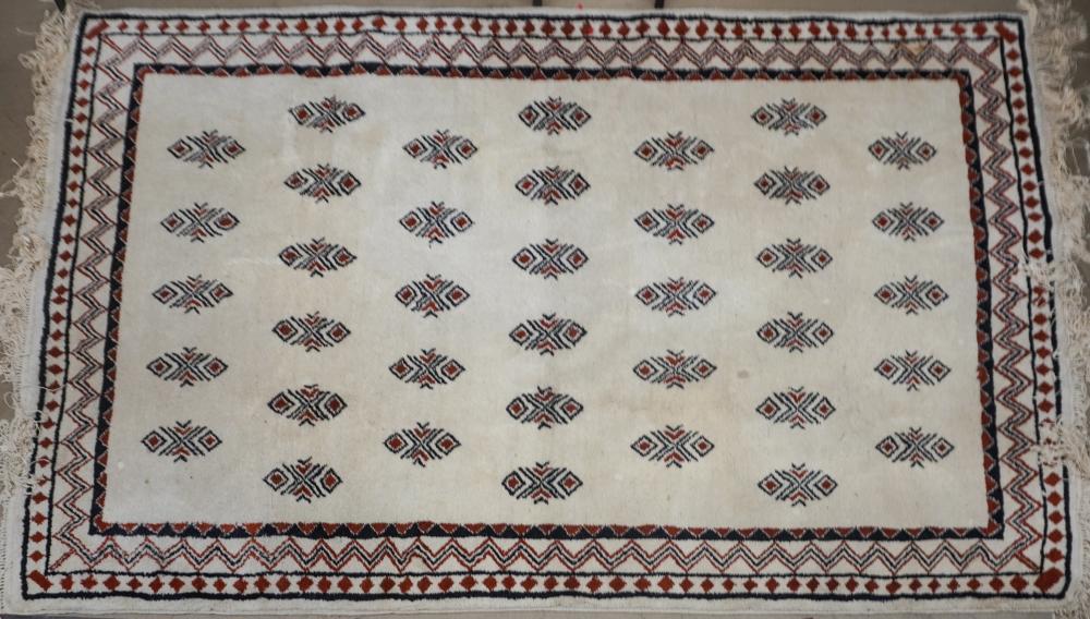 HAUTE VOLTA IVORY GROUND WOOL RUG,