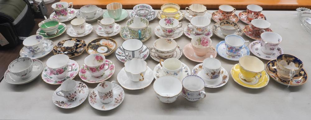 COLLECTION OF 35 TEACUPS AND 34