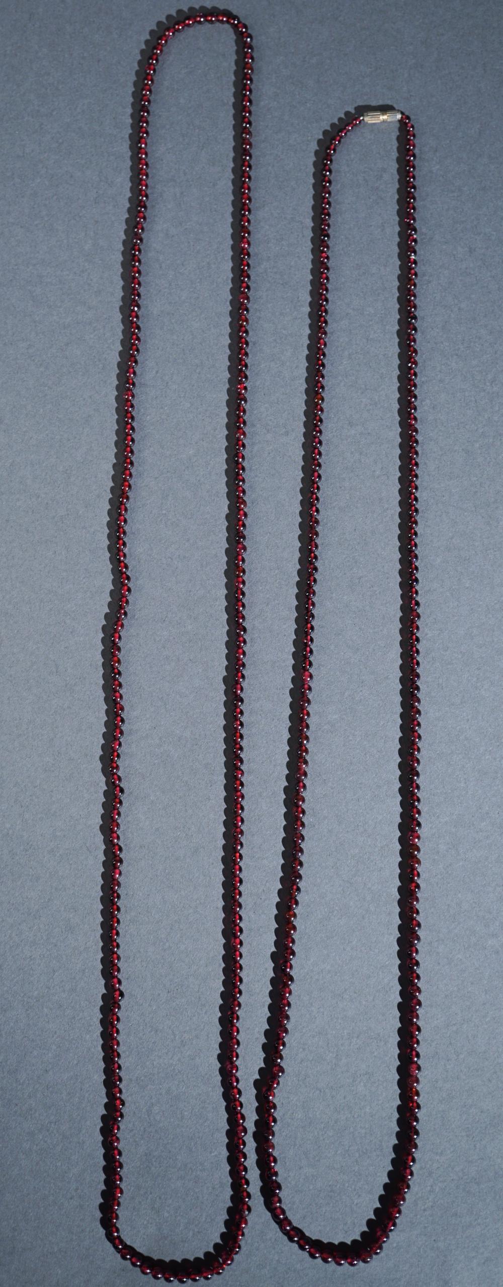 TWO GARNET BEAD NECKLACESTwo Garnet