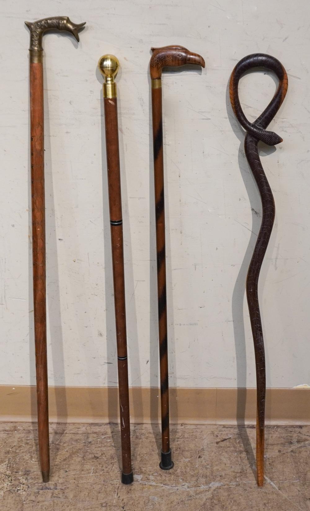 FOUR WOOD CANESFour Wood Canes,