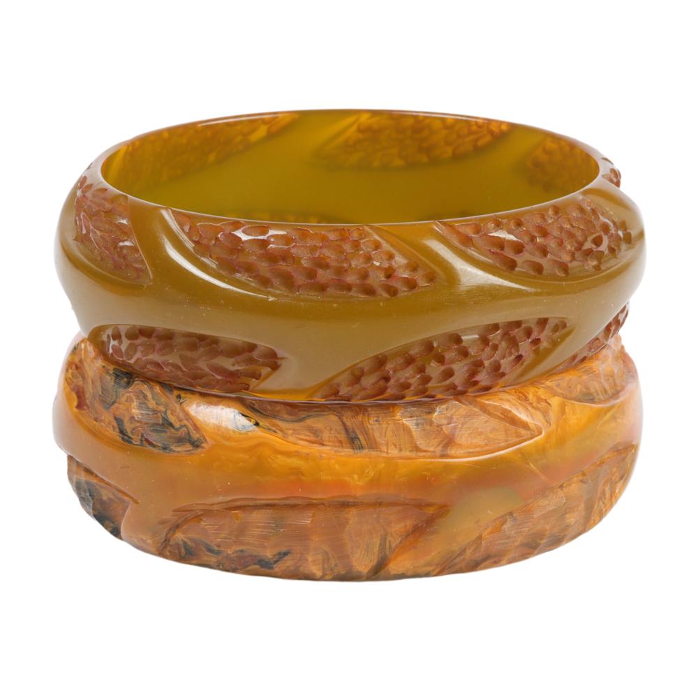 TWO BAKELITE CARVED OVER DYED BANGLE