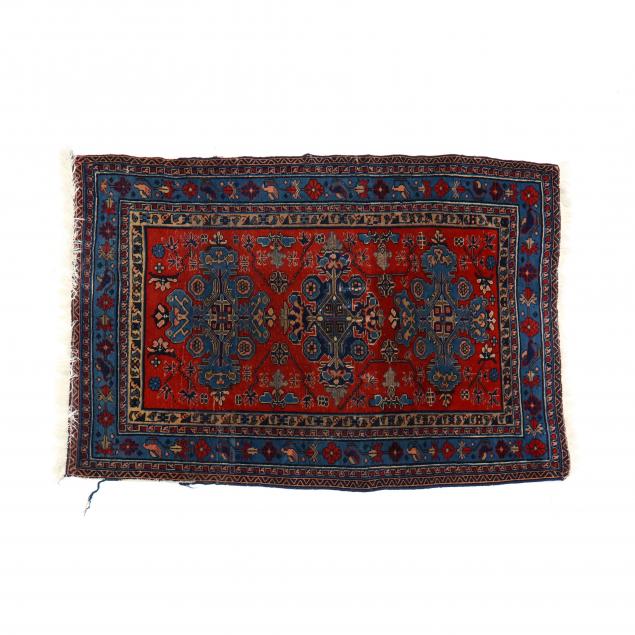 SHIRVAN AREA RUG The red field