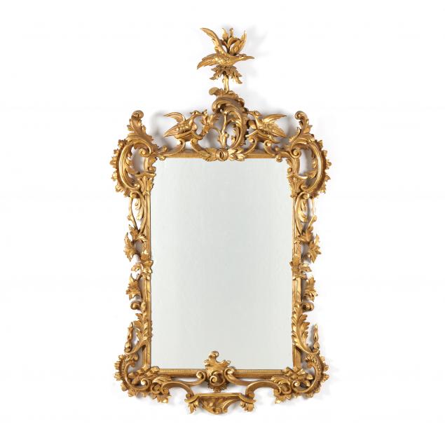 A CONTINENTAL ROCOCO-STYLE GILTWOOD