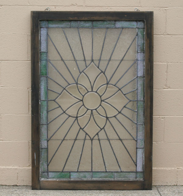 Framed beveled leaded glass window with