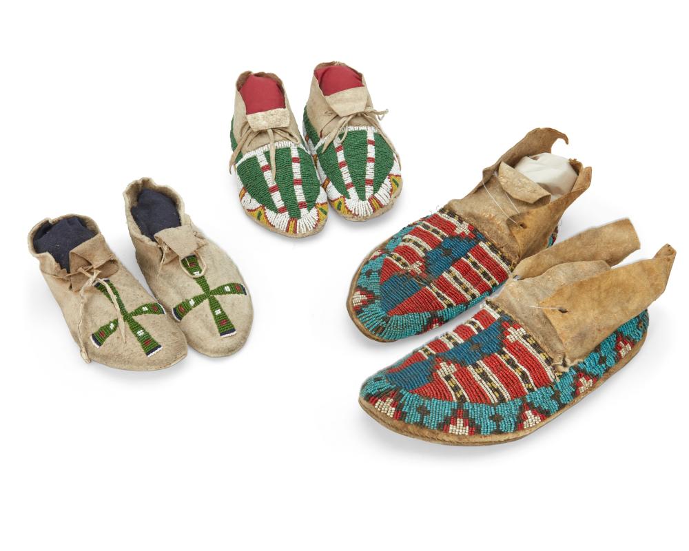 A GROUP OF PLAINS BEADED HIDE MOCCASINSA