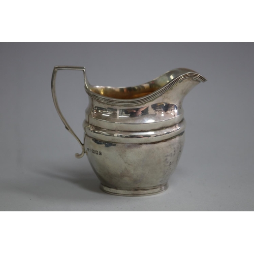 Antique hallmarked sterling silver jug,