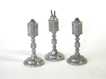 Three pewter cylinder form font 4da4a