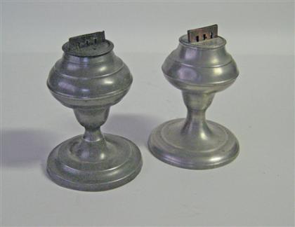 Two pewter lard lamps Each with 4da62