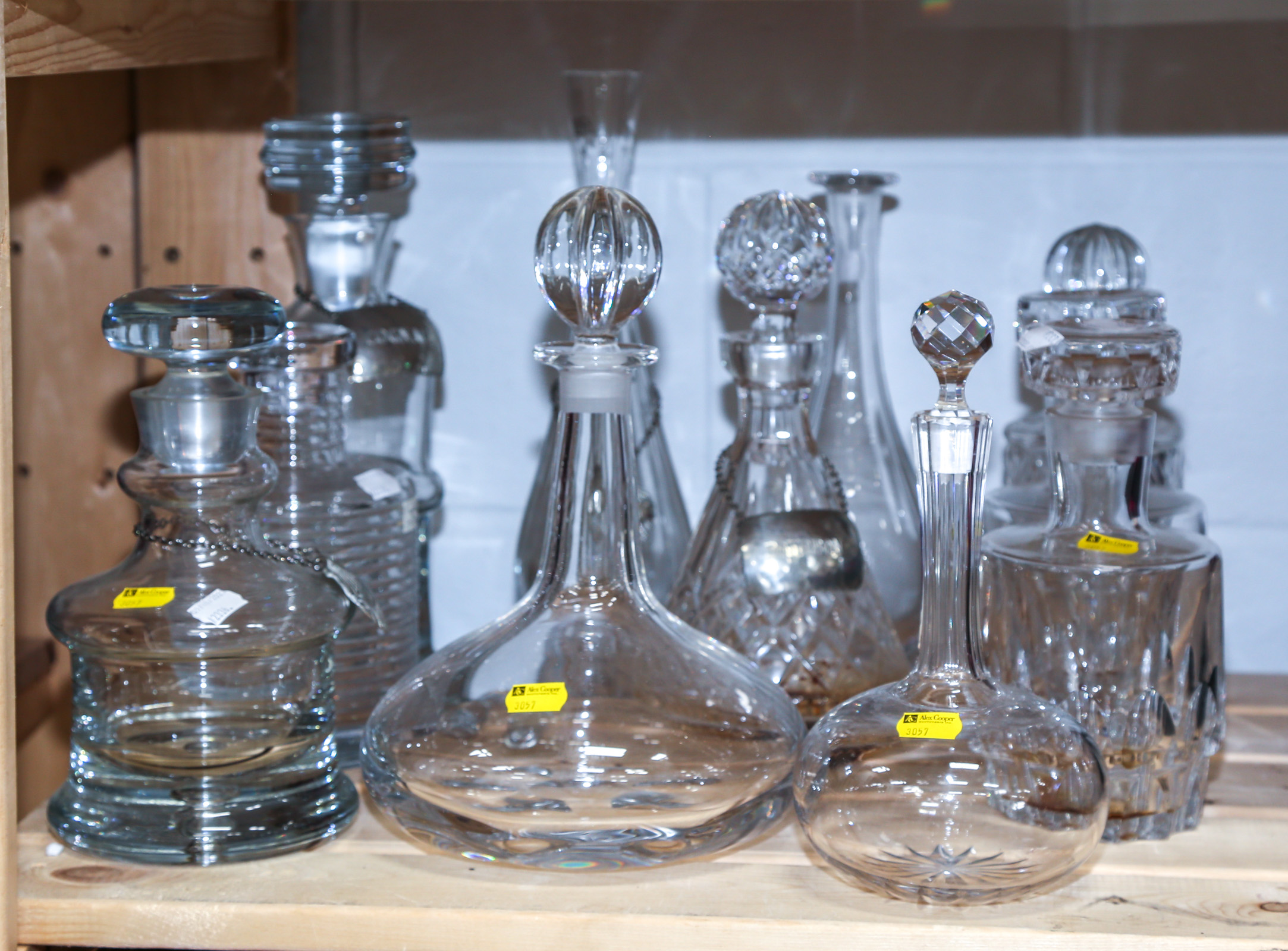 SELECTION OF COLORLESS GLASS DECANTERS 308880