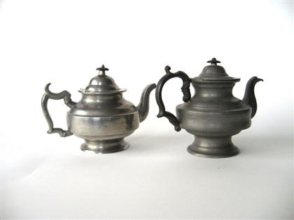 Two pewter teapots    s. simpson