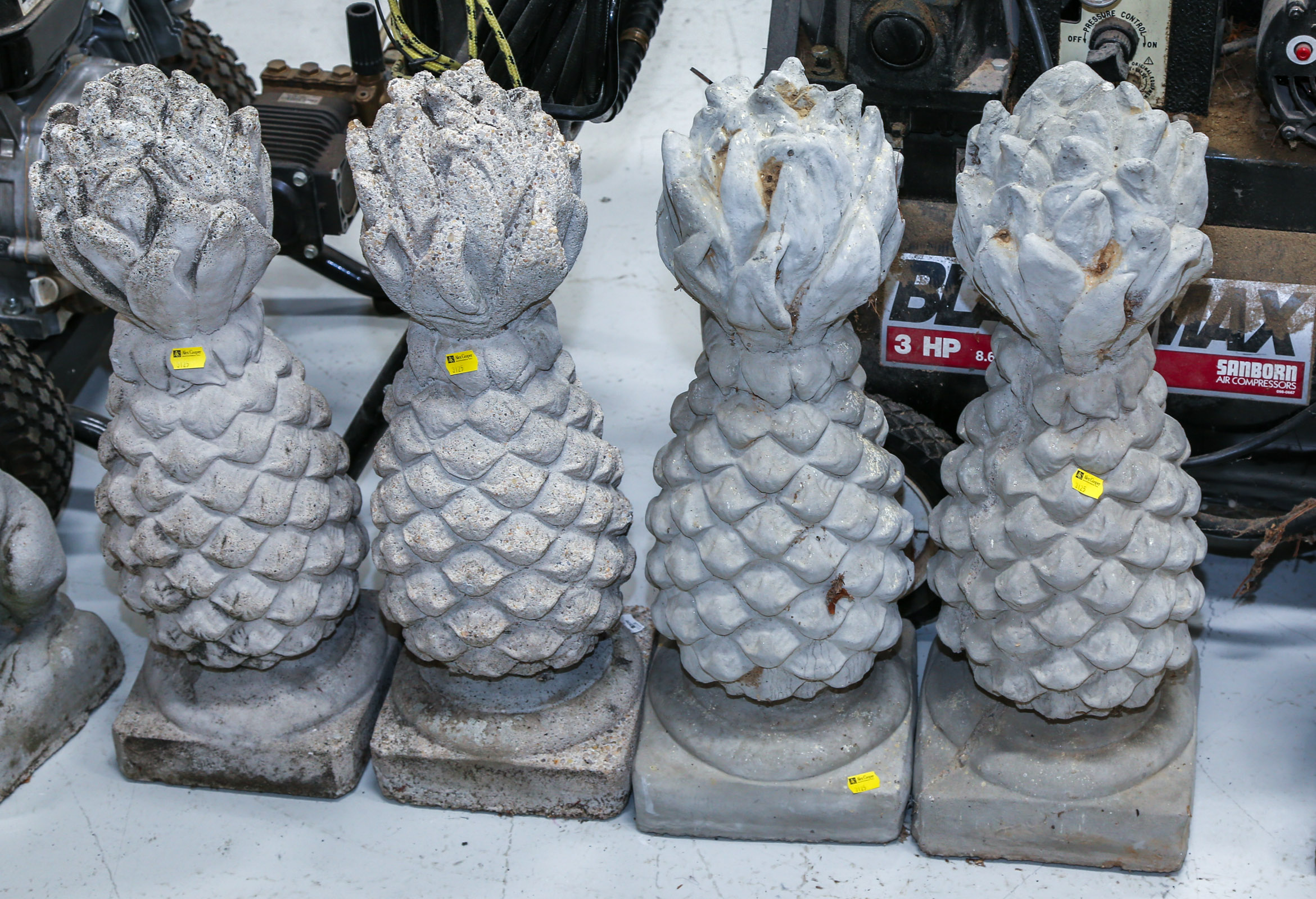 TWO PAIRS OF CEMENT PINEAPPLE  3088c2