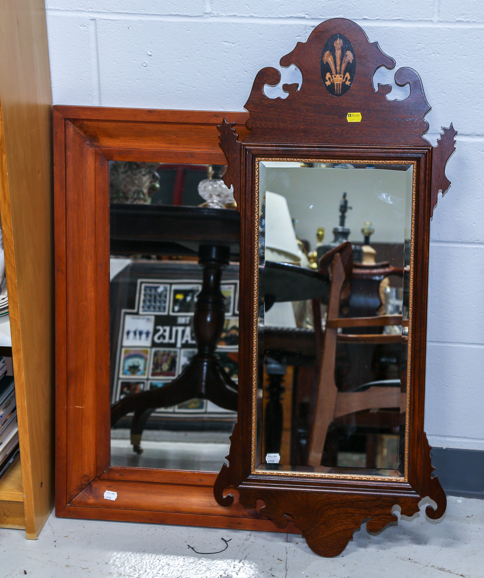 TWO FRAMED MIRRORS Comprising a