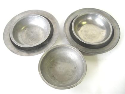 Two pewter deep dishes and three 4da9a