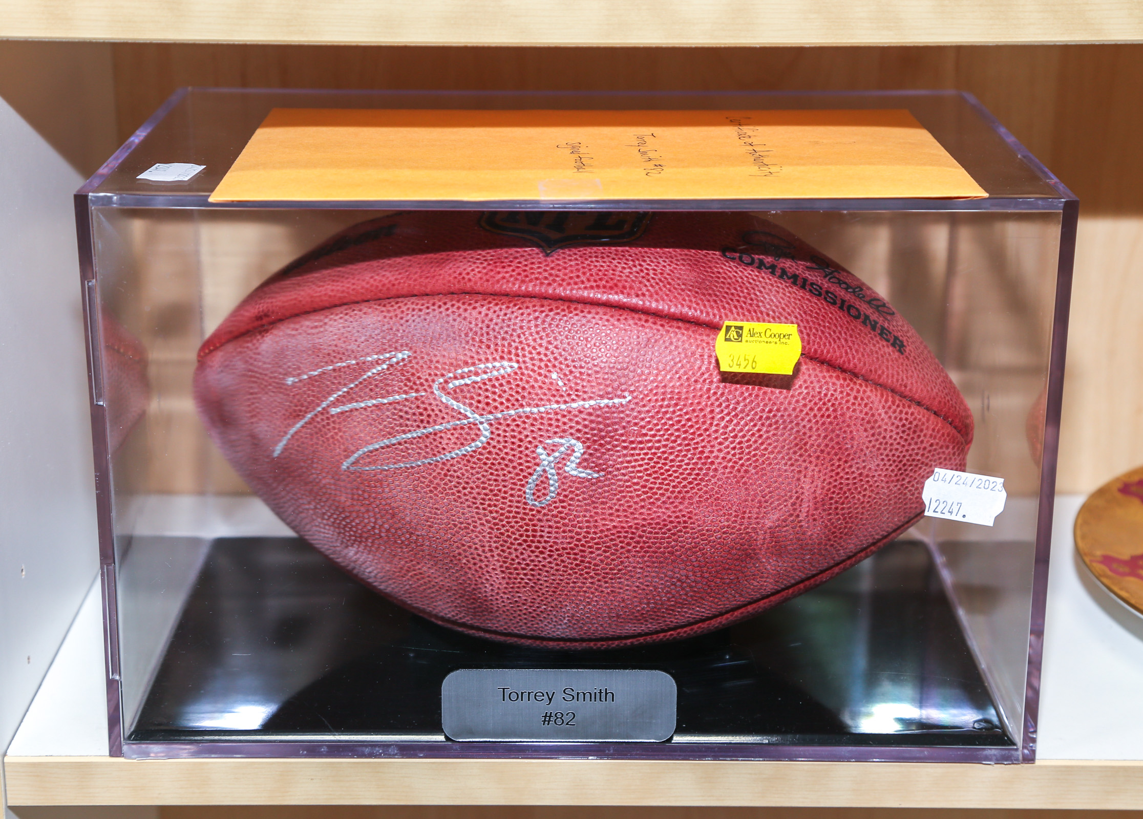 TORREY SMITH SIGNED FOOTBALL In a lucite