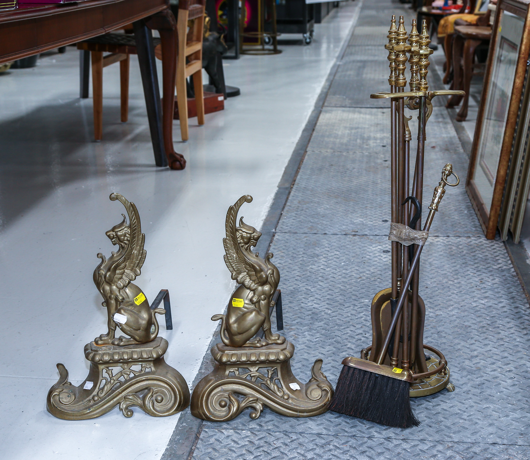 A PAIR OF BRASS FIGURAL CHENETS