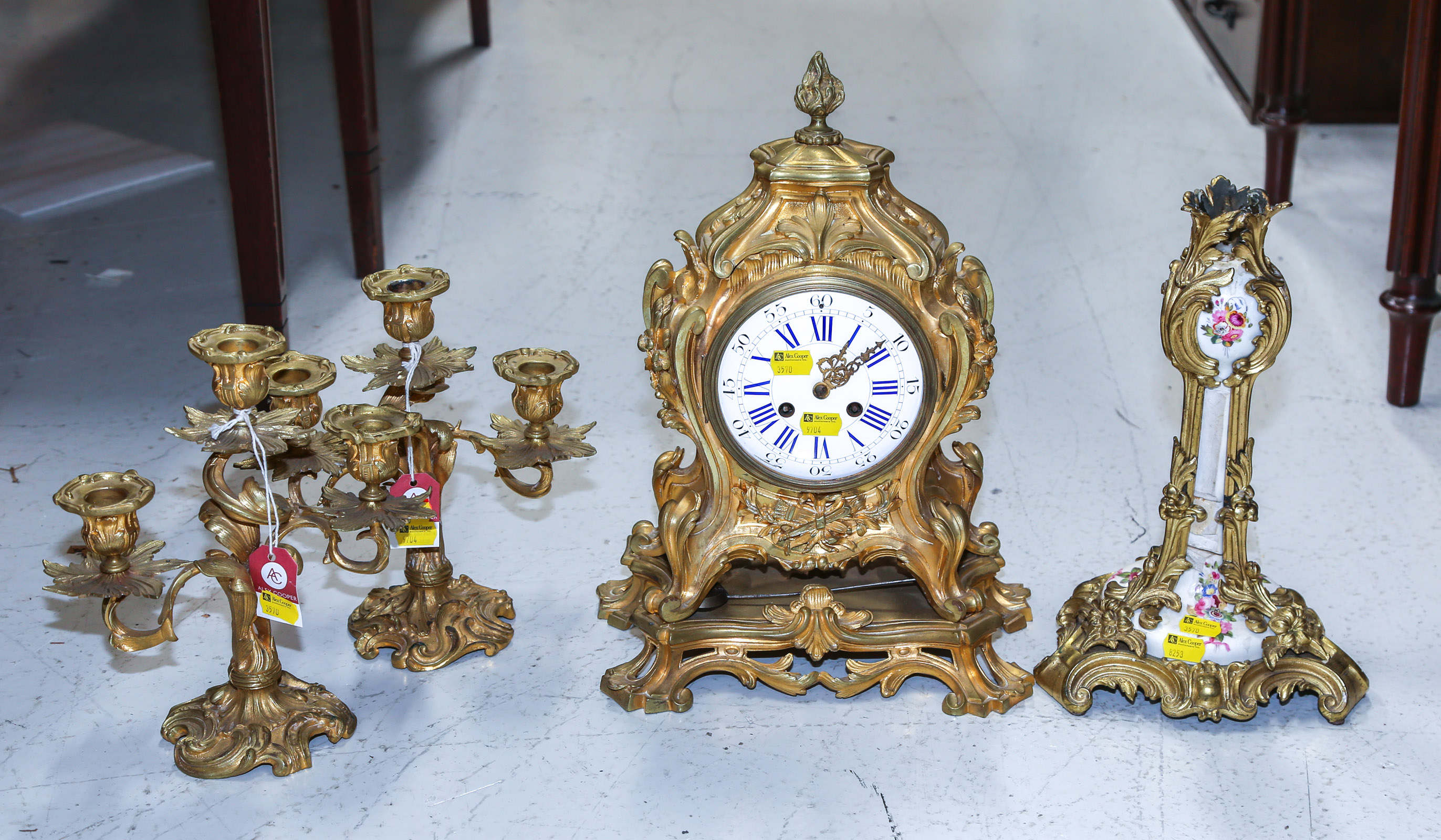 BRONZE SHELF CLOCK WITH CANDLESTICKS