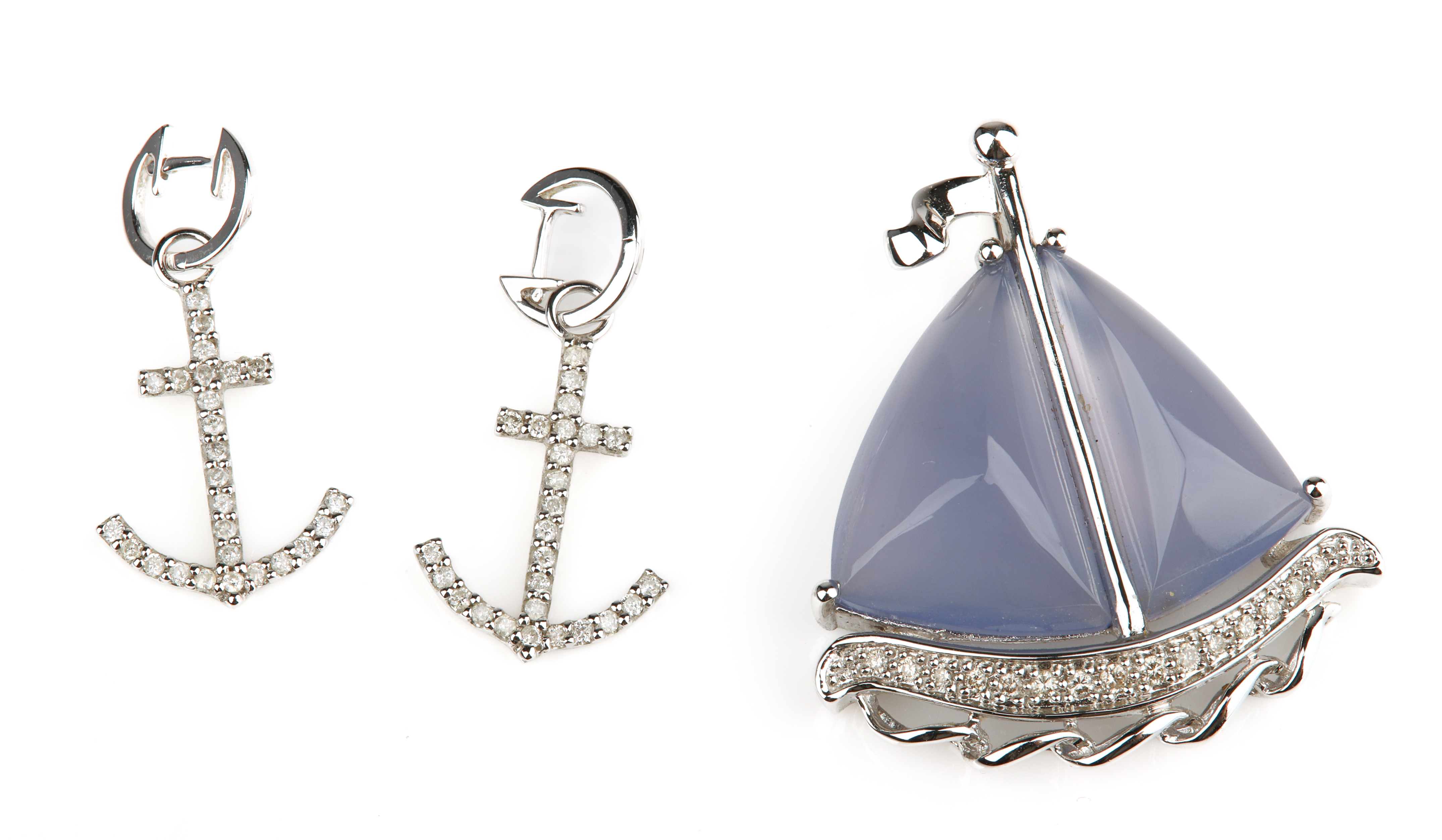 Diamond anchor earrings and sailboat