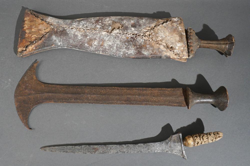 THREE AFRICAN KNIVES, ONE WITH SHEATHThree
