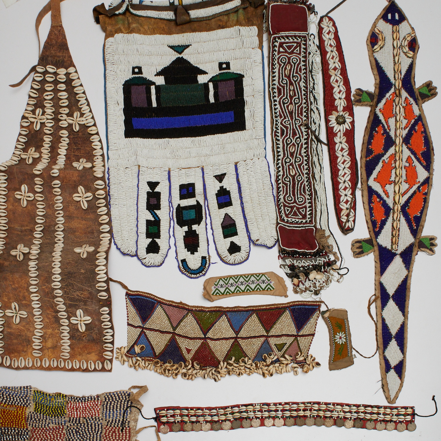 GROUP TRIBAL BEAD AND SHELL ADORNED