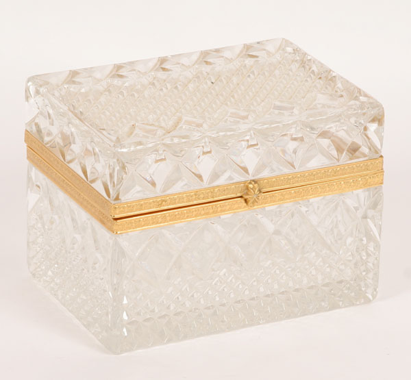 Molded glass jewelry box with gold trim;