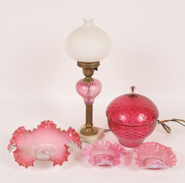 Cranberry glass articles including