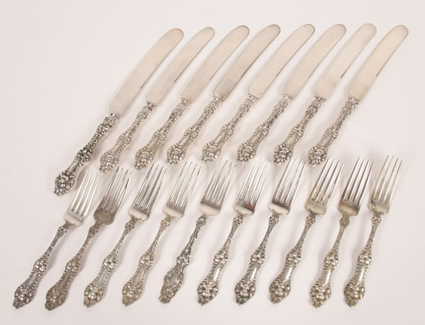 Ten forks seven luncheon knives  4e00c