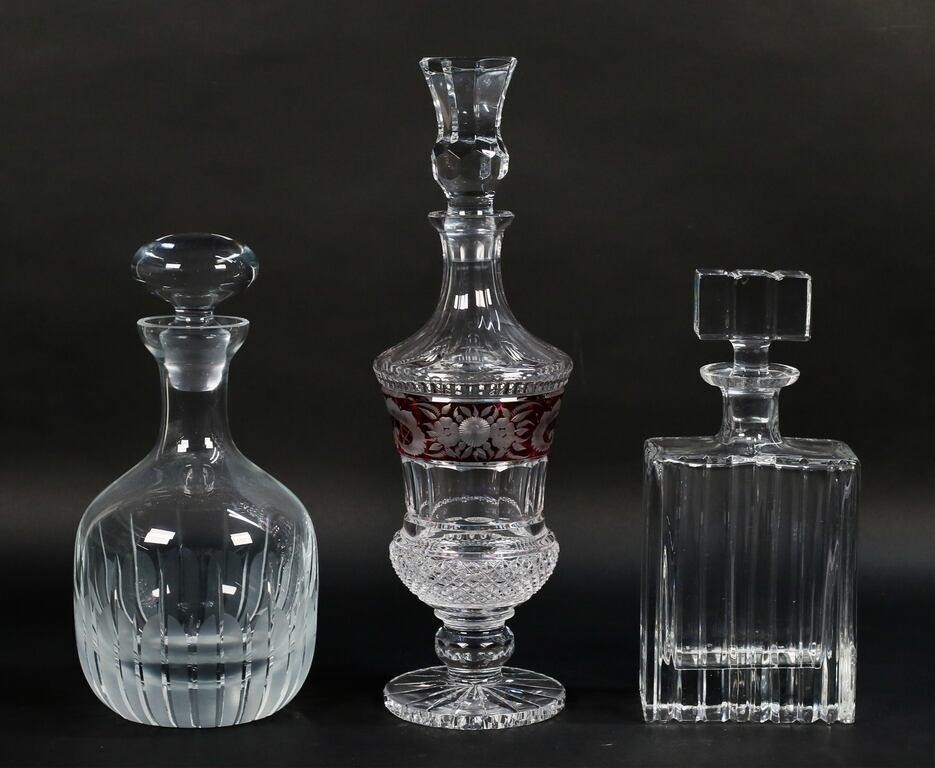 3 CRYSTAL DECANTERS3 crystal decanters.