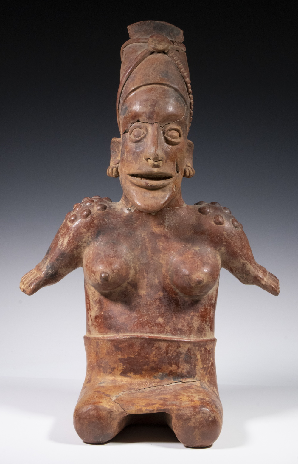 LARGE FEMALE RED CLAY FIGURAL SCULPTURE