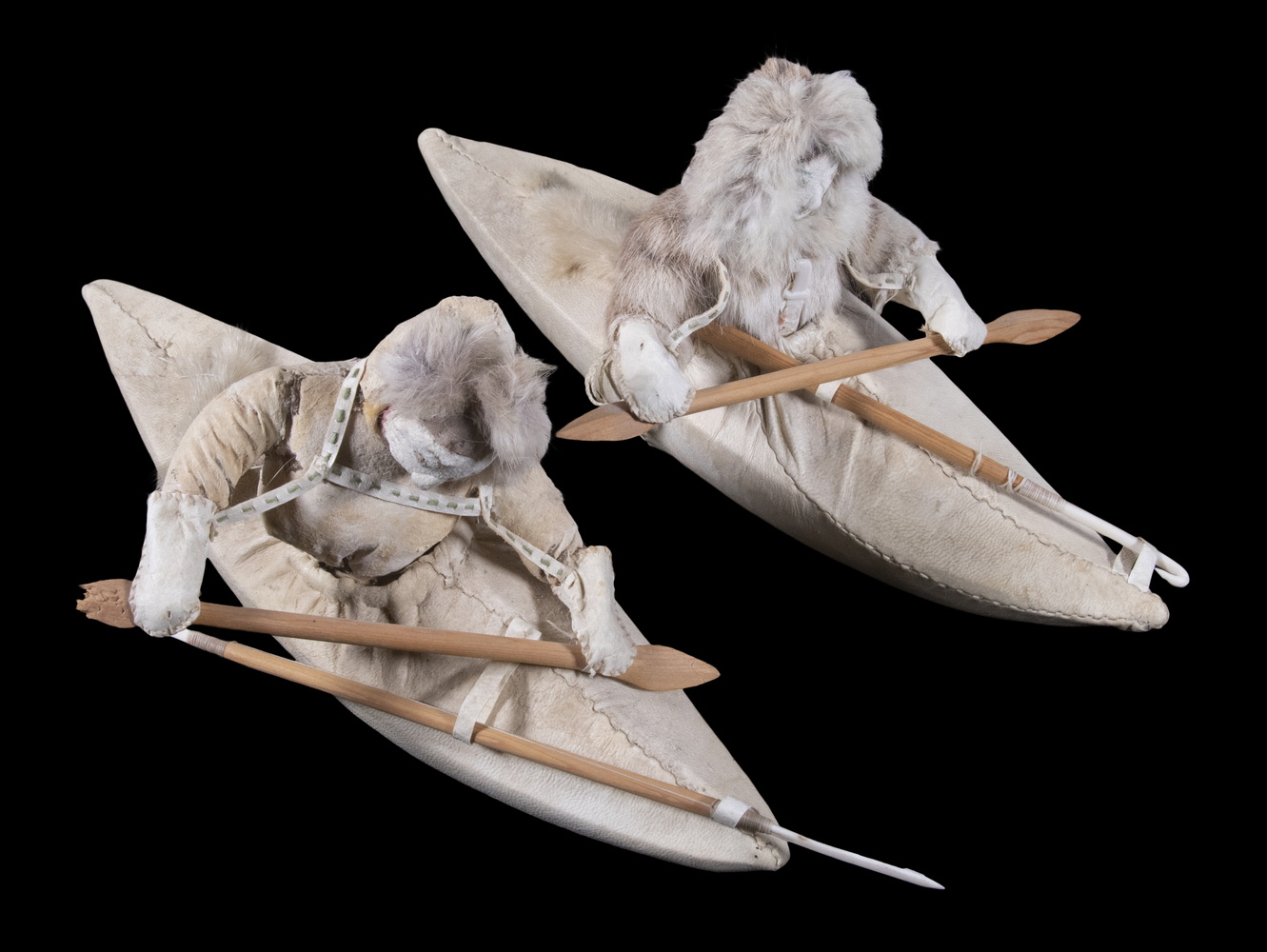 (2) INUIT SEALSKIN TOY KAYAKS WITH HUNTERS