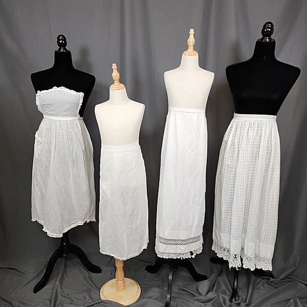 4 Vintage White Aprons. Includes